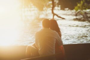 Tender Couple Looking At The Sunset